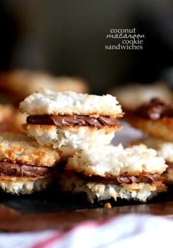 Coconut Macaroon Cookie Sandwiches ~ Two coconut macaroons sandwiched together with a creamy chocolate filling!