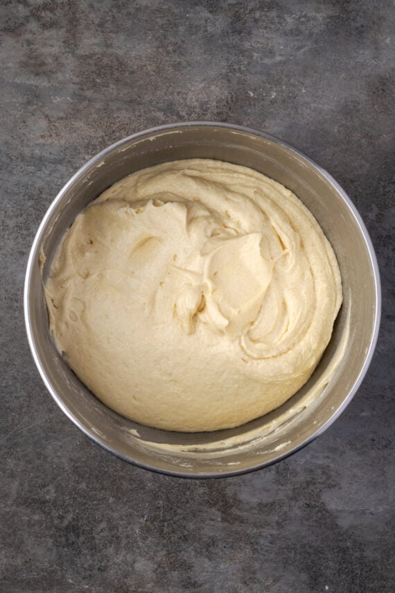 Vanilla cake batter in a mixing bowl.