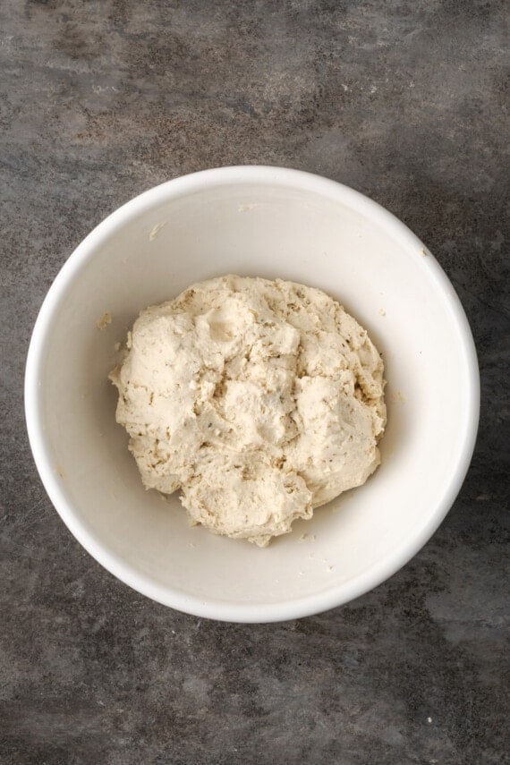 A ball of Bisquick dough in a white bowl.