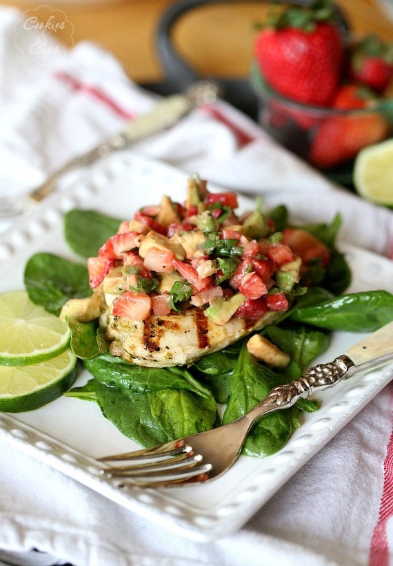 Grilled Lime Chicken with Strawberry Avocado Salsa over a bed of Spinach