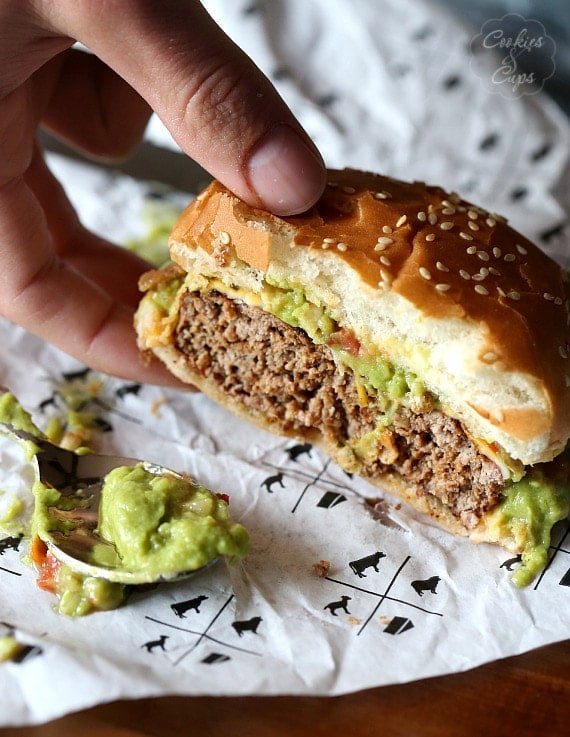 Taco Burgers.. simple burger patties seasoned with Taco seasoning and topped with your favorite taco toppers!