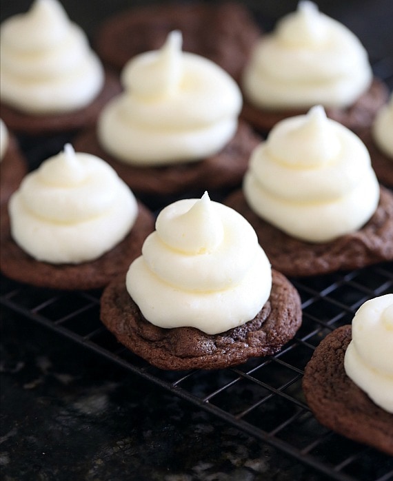 Swirls of frosting on chocolate cookies!