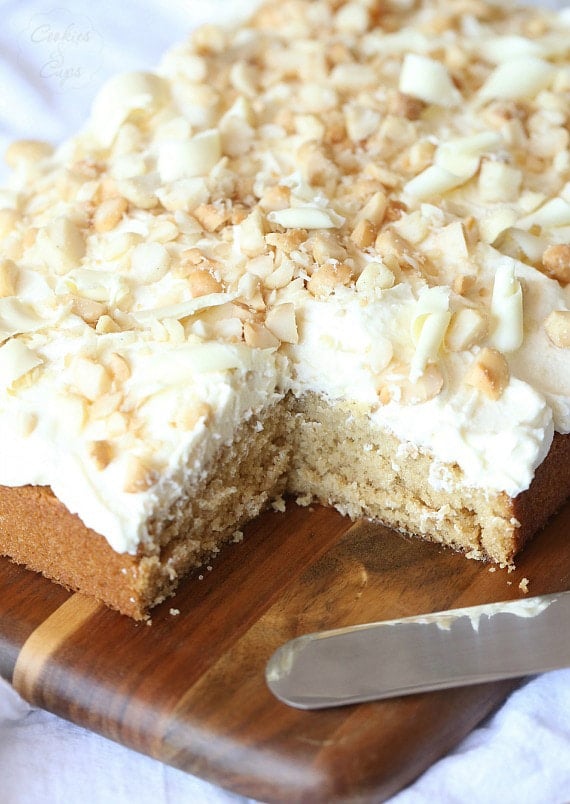 White Chocolate Macadamia Nut Cake.. A simple brown sugar buttermilk cake with white chocolate frosting, topped with salty Macadamia Nuts!