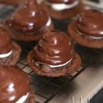 Hi Hat Cookies.. a chewy chocolate chip cookie topped with a swirl of frosting, dipped in chocolate coating. A fun spin on the classic cupcake!