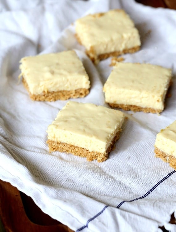 Lemon ice bars arranged on a white cloth.