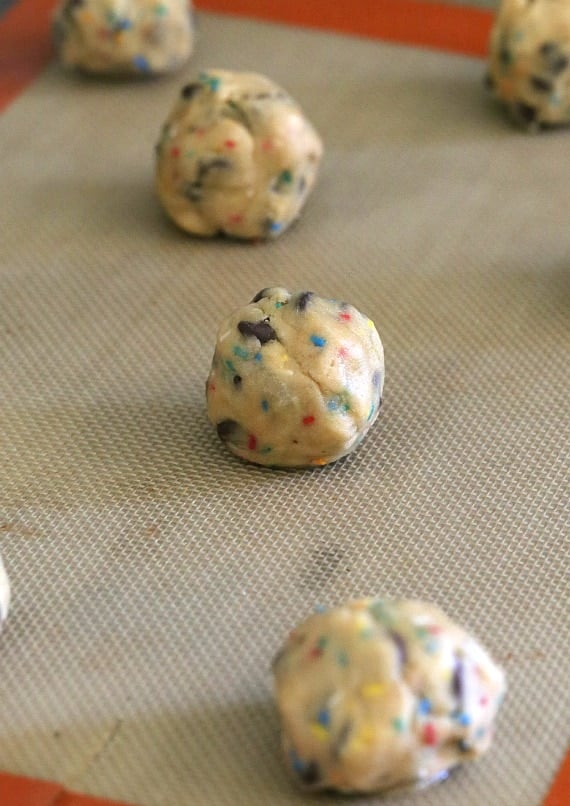 Roll the cookie dough into balls and bake!