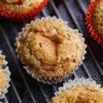 Carrot Cake Muffins on a cooling rack topped with crunchy sugar