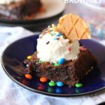 Ice Cream Sundae Brownies...a rich caramel brownie loaded with M&Ms and topped with frosting that looks like ice cream!