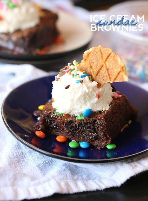 Ice Cream Sundae Brownies...a rich caramel brownie loaded with M&Ms and topped with frosting that looks like ice cream!