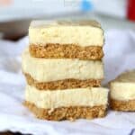 A stack of Lemon Icebox Bars with graham cracker crust