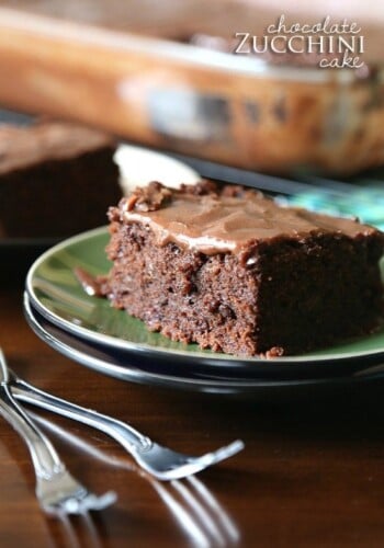 Chocolate Zucchini Cake...a rich , dense chocolate cake made with shredded zucchini. It's topped with a poured chocolate frosting that melts right into the cake!