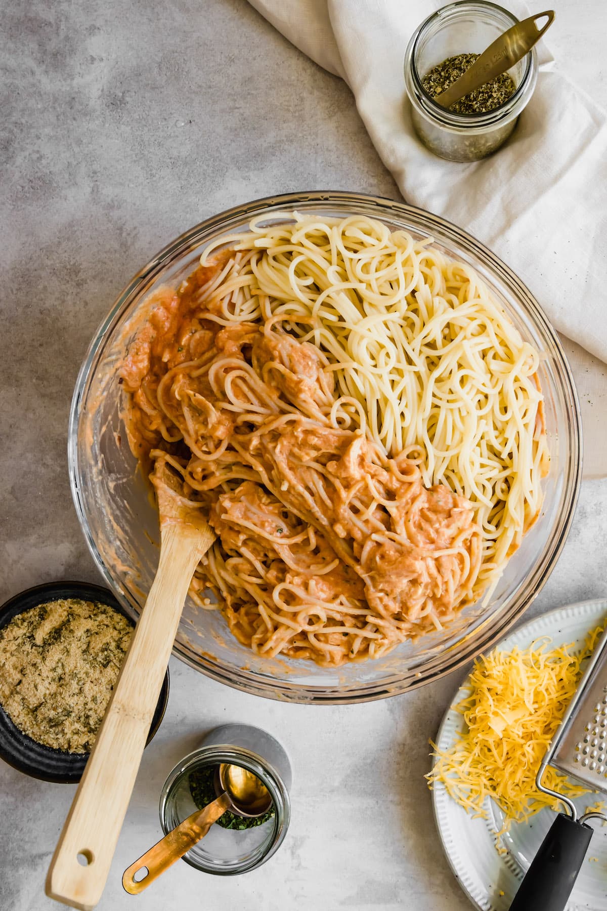 Spaghetti mixed with tomato sauce and soup.