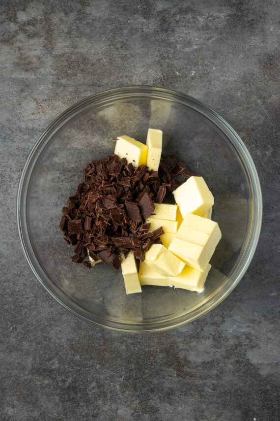 Chocolate and butter combined in a bowl.