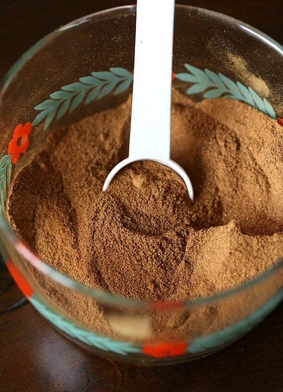 Pumpkin Pie Spice with a spoon, the key ingredient in this snickerdoodle recipe
