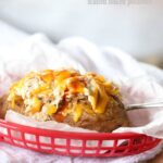 Cheesy Spicy Ranch Stuffed Baked Potatoes...the most addicting baked potato you'll ever eat!