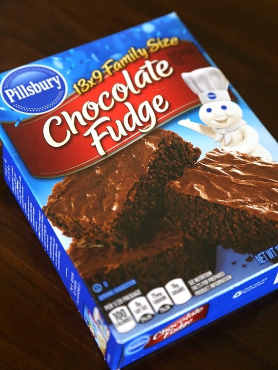 A box of Pillsbury Chocolate Fudge Brownie Mix lying on its side.
