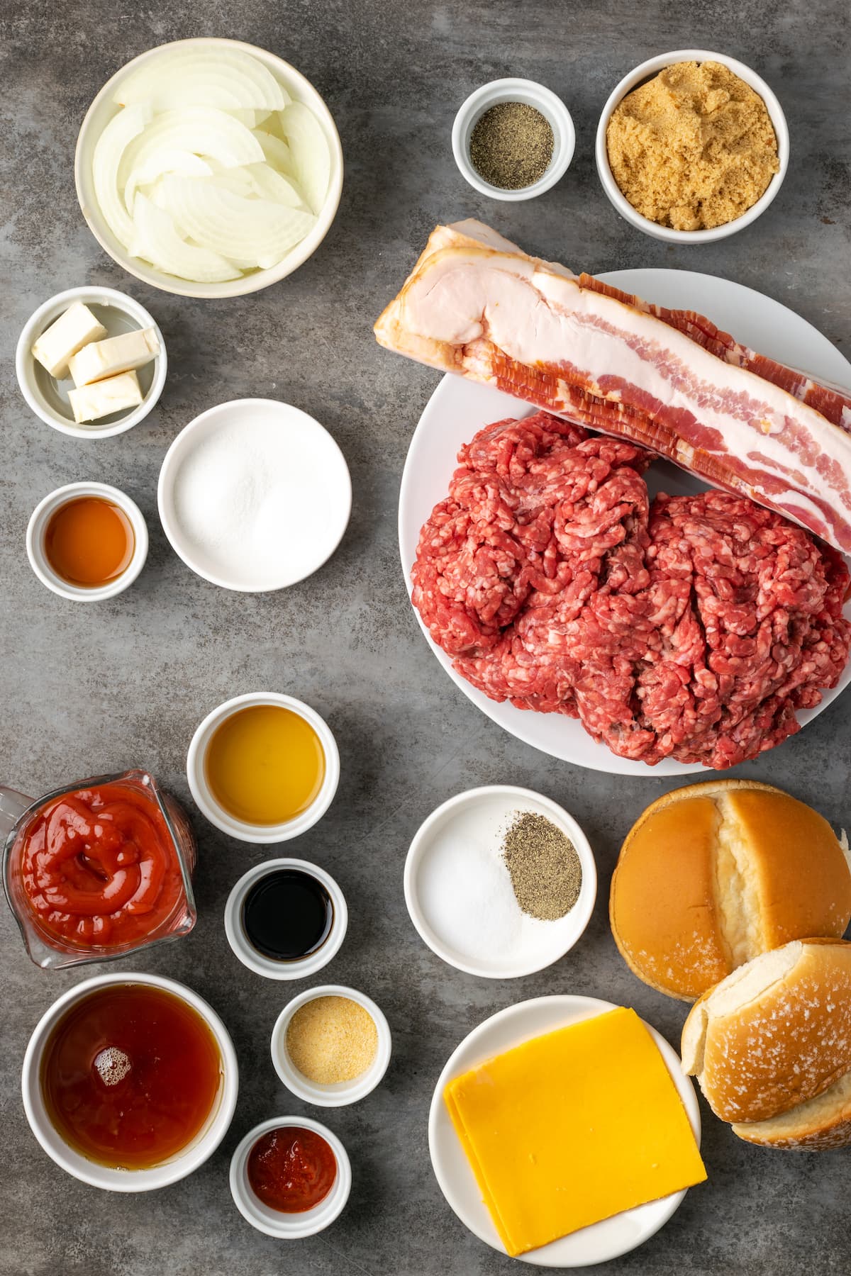 The ingredients for homemade candied bacon maple cheddar burgers.