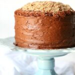 Bacon Pecan Crumble Chocolate Cake...This cake is EPIC! Such soft chocolate cake, amazing frosting and topped with a thick layer of caramel and salty bacon pecan crumble!! CRAZY GOOD!!