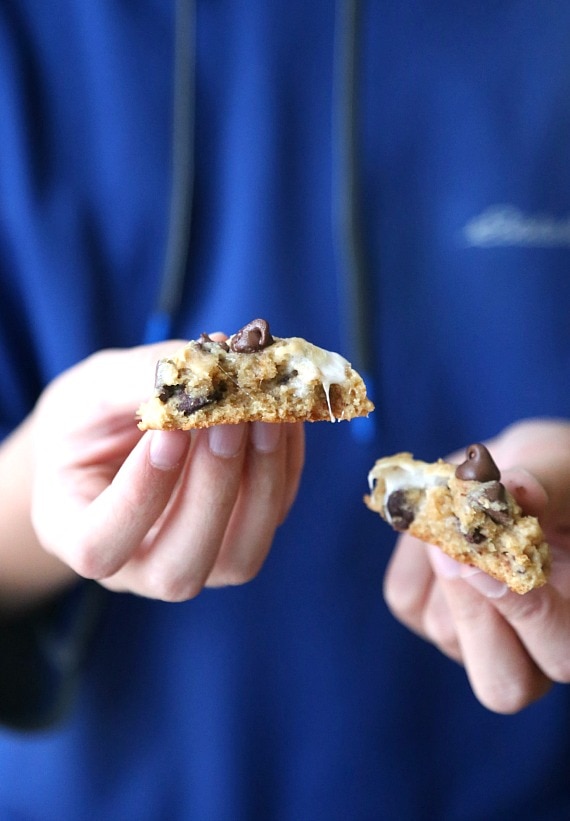 Hands holding two halves of a Campfire Cookie