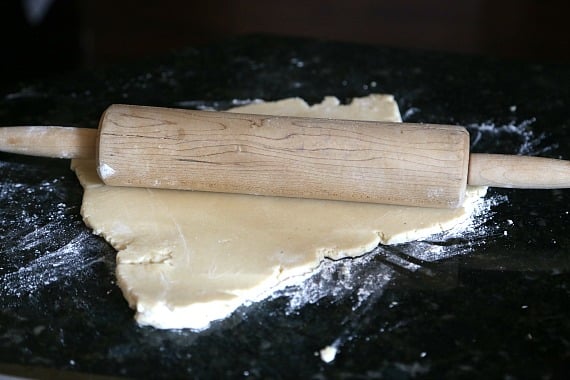 Rolling out cream cheese sugar cookie dough