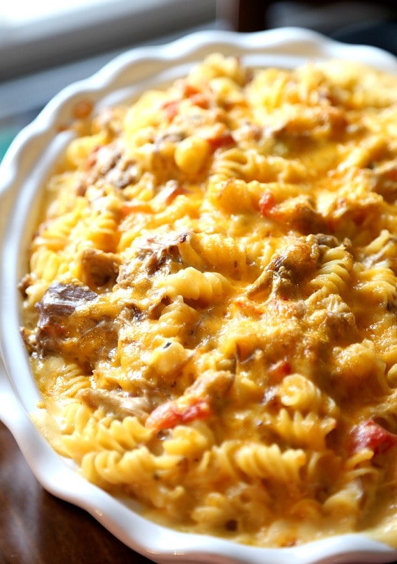 Pork Carnitas Mac and Cheese...simple slow cooker Pork Carnitas mixed into a creamy, slightly spicy mac and cheese!