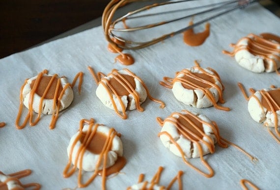 Butterbeer Cookies...A buttery shortbread Meltaway base topped with a creamy Butterscotch Ganache! Tastes like the perfect little bite of Harry Potter's Butterbeer!