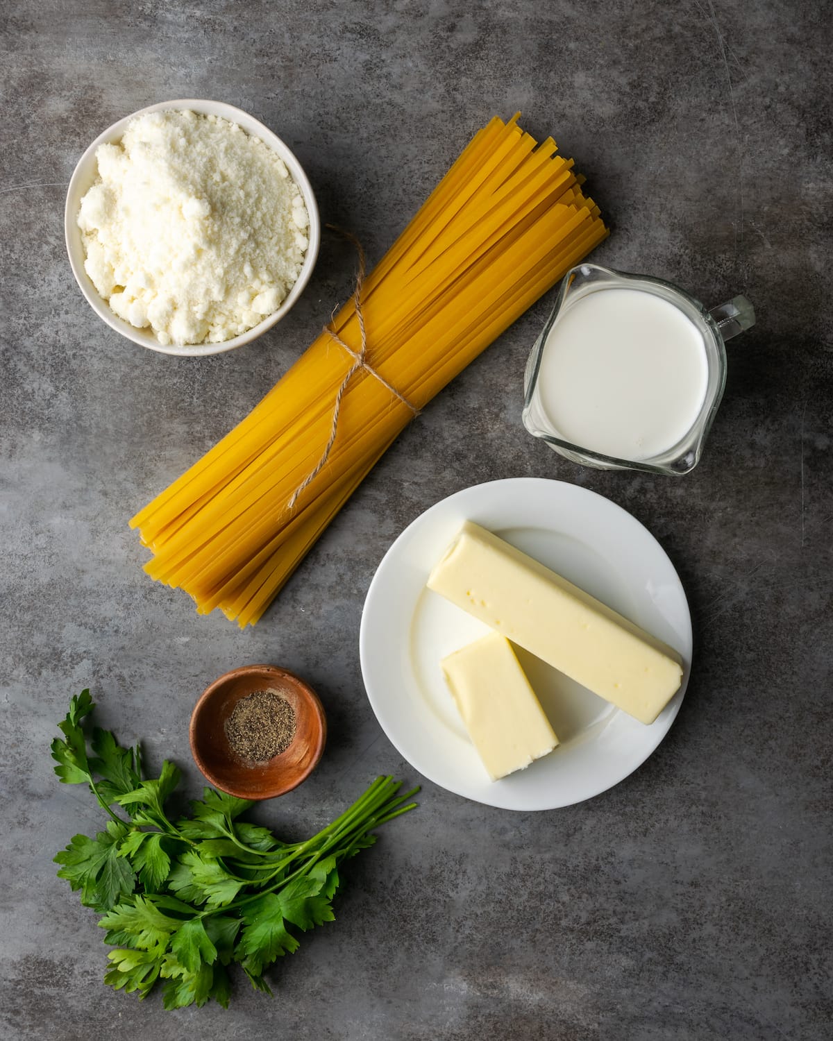 The ingredients for homemade fettuccine Alfredo.