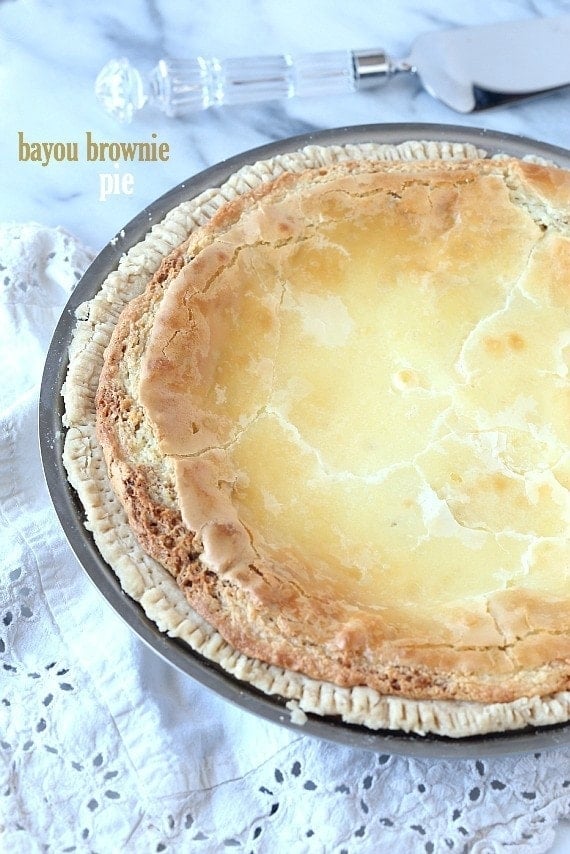 Bayou Brownie Pie...This pie is CRAZY good! Its a buttery blondie-brownie filling with an ooey gooey cream cheese topping!