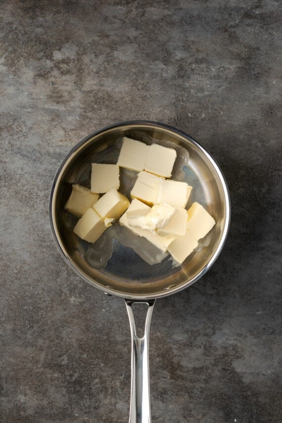 Cubed butter in a saucepan.