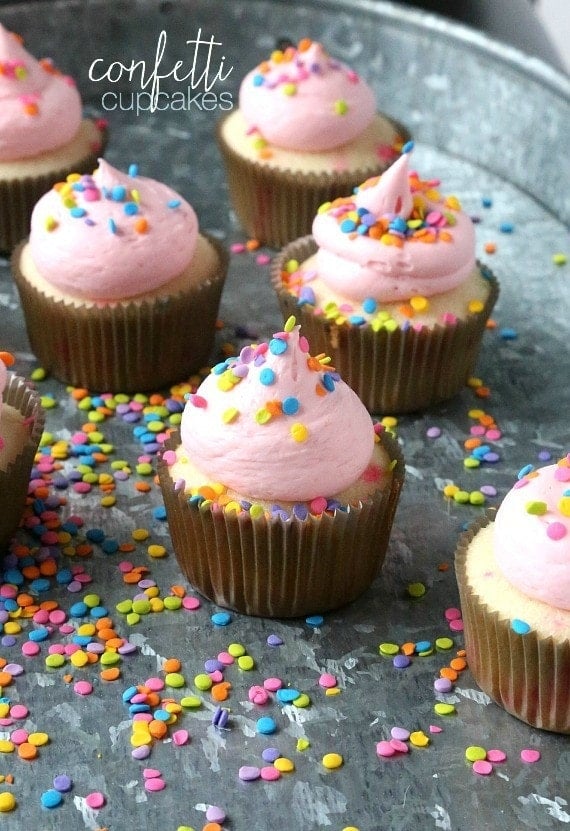 Confetti Cupcakes that are super soft, buttery and topped with sweet fluffy buttercream! The perfect party cupcake!