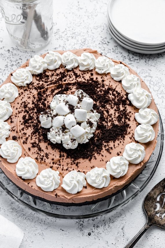Chocolate pie with Oreo crumbs and whipped cream.