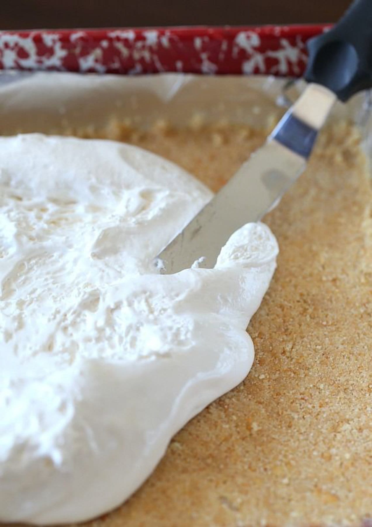 Marshmallows pressed on top of crackers 