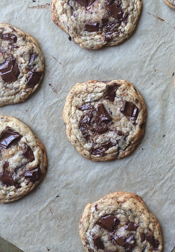 Bakery Style Chocolate Chunk Toffee Cookies. Perfectly crispy at the edge, soft in the center with little bits of sea salt to balance out the creamy chocolate!