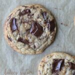 Bakery Style Chocolate Chunk Toffee Cookies. Perfectly crispy at the edge, soft in the center with little bits of sea salt to balance out the creamy chocolate!