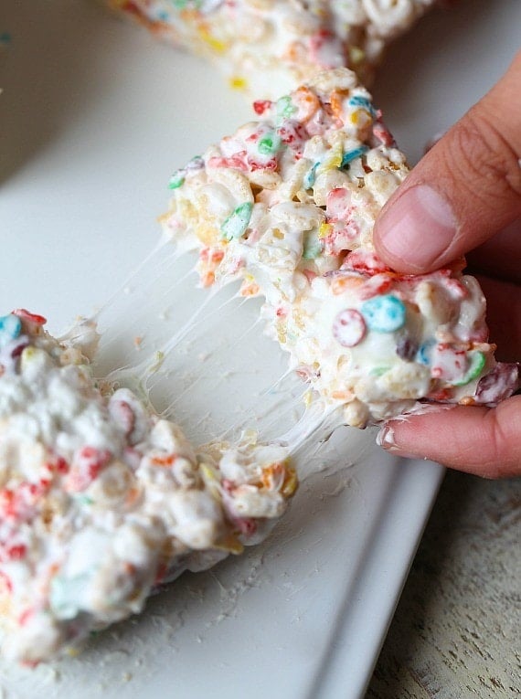 Overhead view of a Fluff Krispie Treat being broken apart