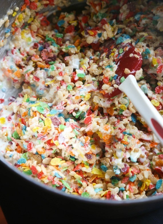 Overhead view of Krispie Treats with fluff being mixed in a bowl