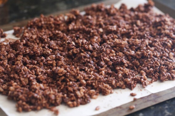 Nutella crunch topping on parchment paper.