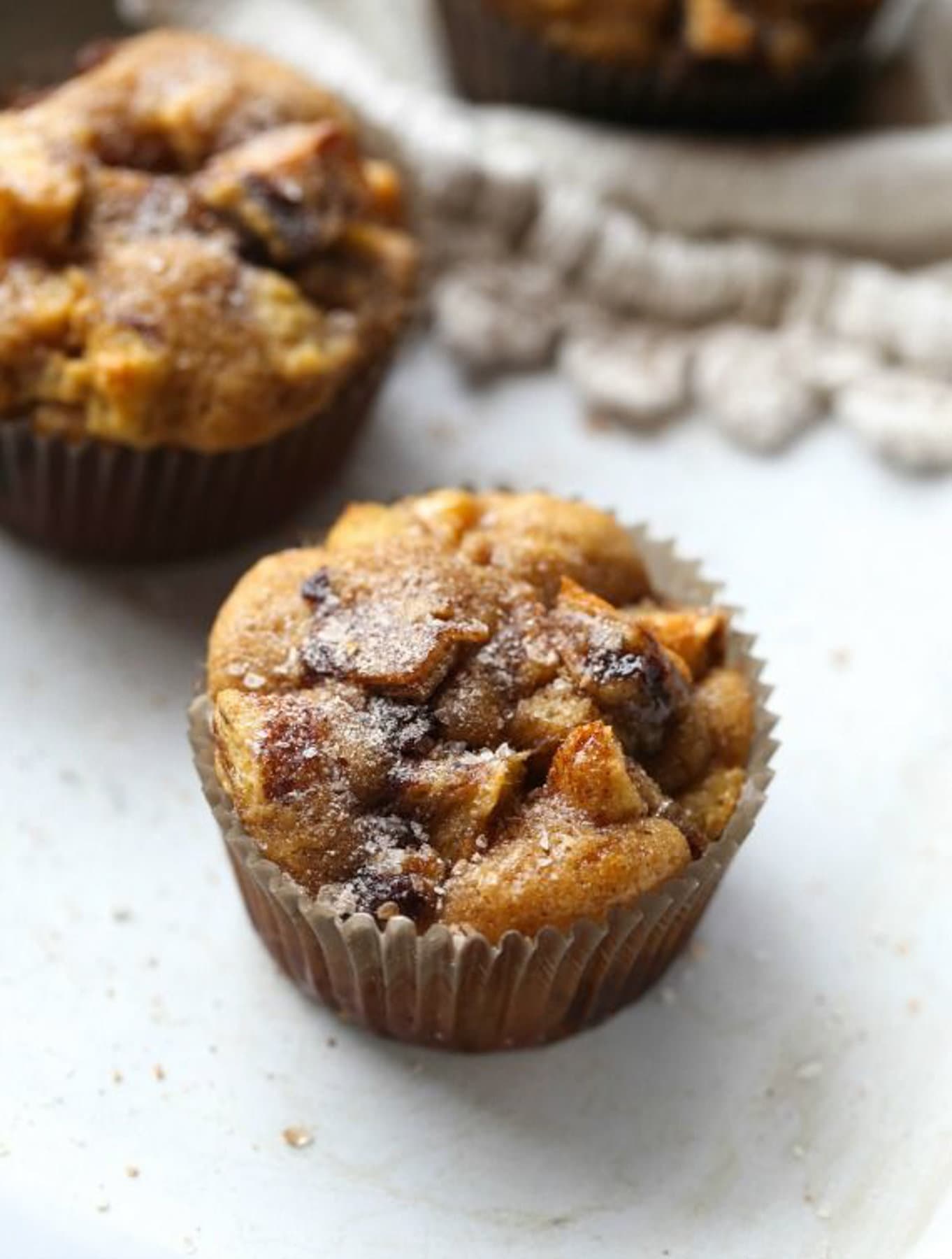 Maple syrup muffin topped with powdered sugar