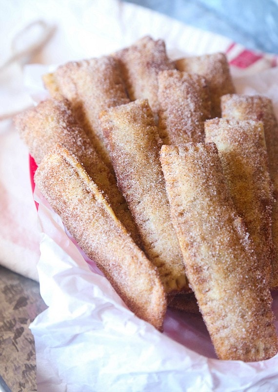 These Dulce de Leche filled Churro Sticks are so simple, crispy and cinnamon sweet! Perfectly portable so they're great for a party!