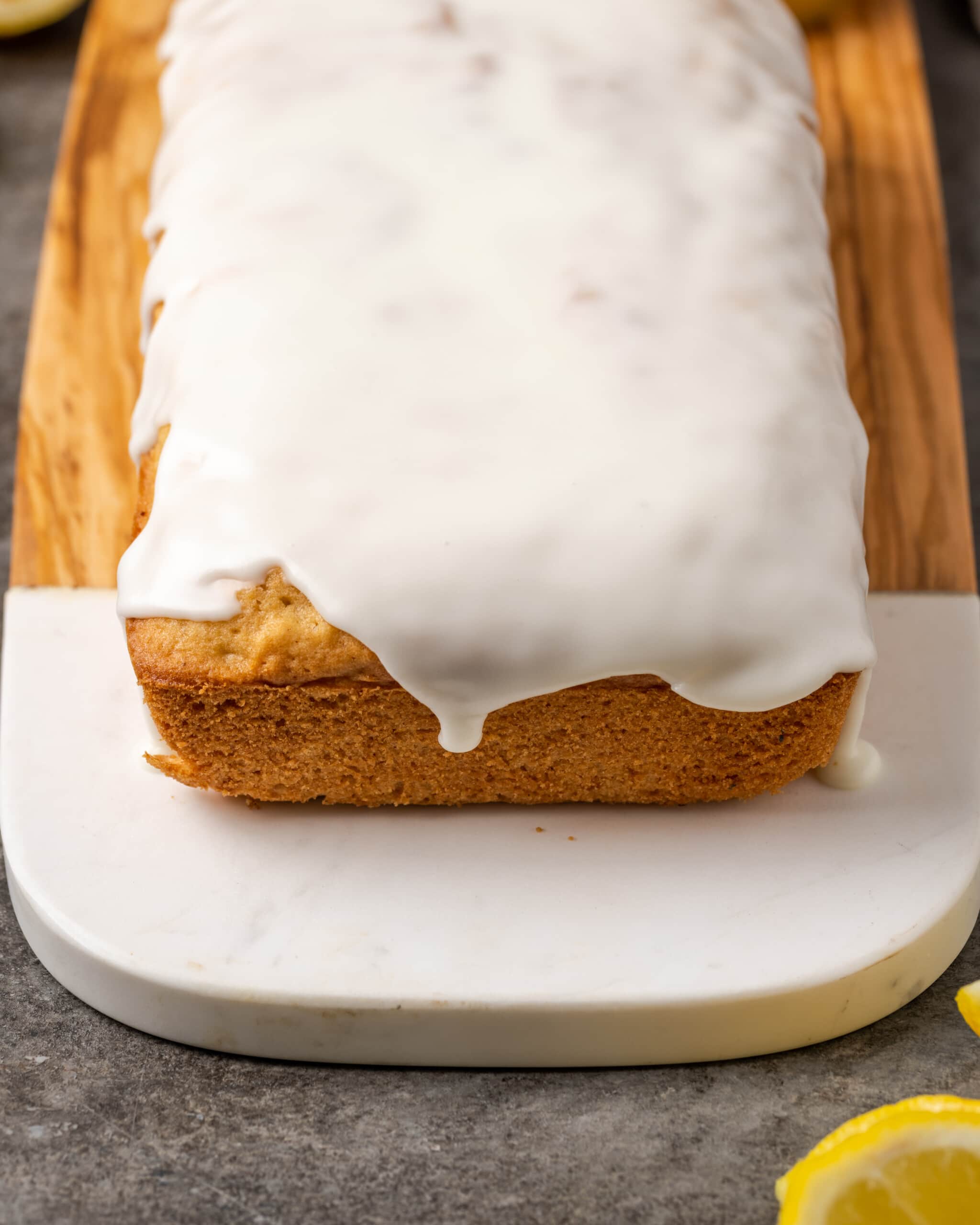 Overhead view of a lemon pound cake topped with lemon glaze.