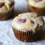 Moist white chocolate raspberry muffins dipped in glaze.