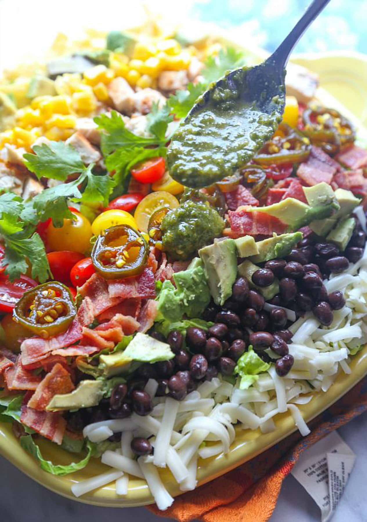 Southwest Cobb salad served on a platter with a vinaigrette 