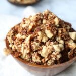 This Coffee Cake Granola combines the best part of the coffee cake, THE CRUMB TOPPING, with a honey sweetened, buttery, crunchy granola!