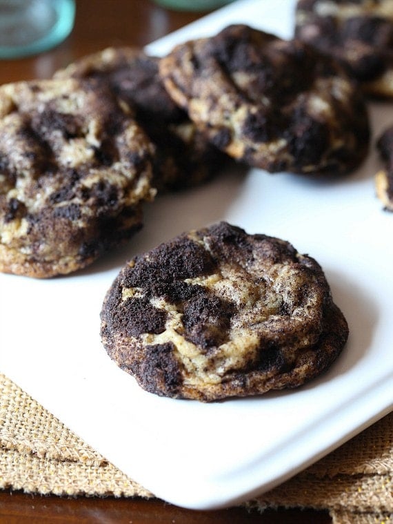 Dirty Chocolate Chip Cookies...these are super soft chocolate chip cookies loaded with Oreo bits ROLLED in Oreo dust! LOVE these!