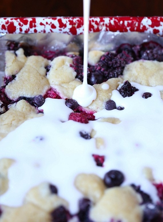 These soft Glazed Berry Sugar Bars are bursting with summer berry flavors! The cookie is soft and buttery, the berries are sweet and flavorful and it's all topped with a creamy sugar glaze!