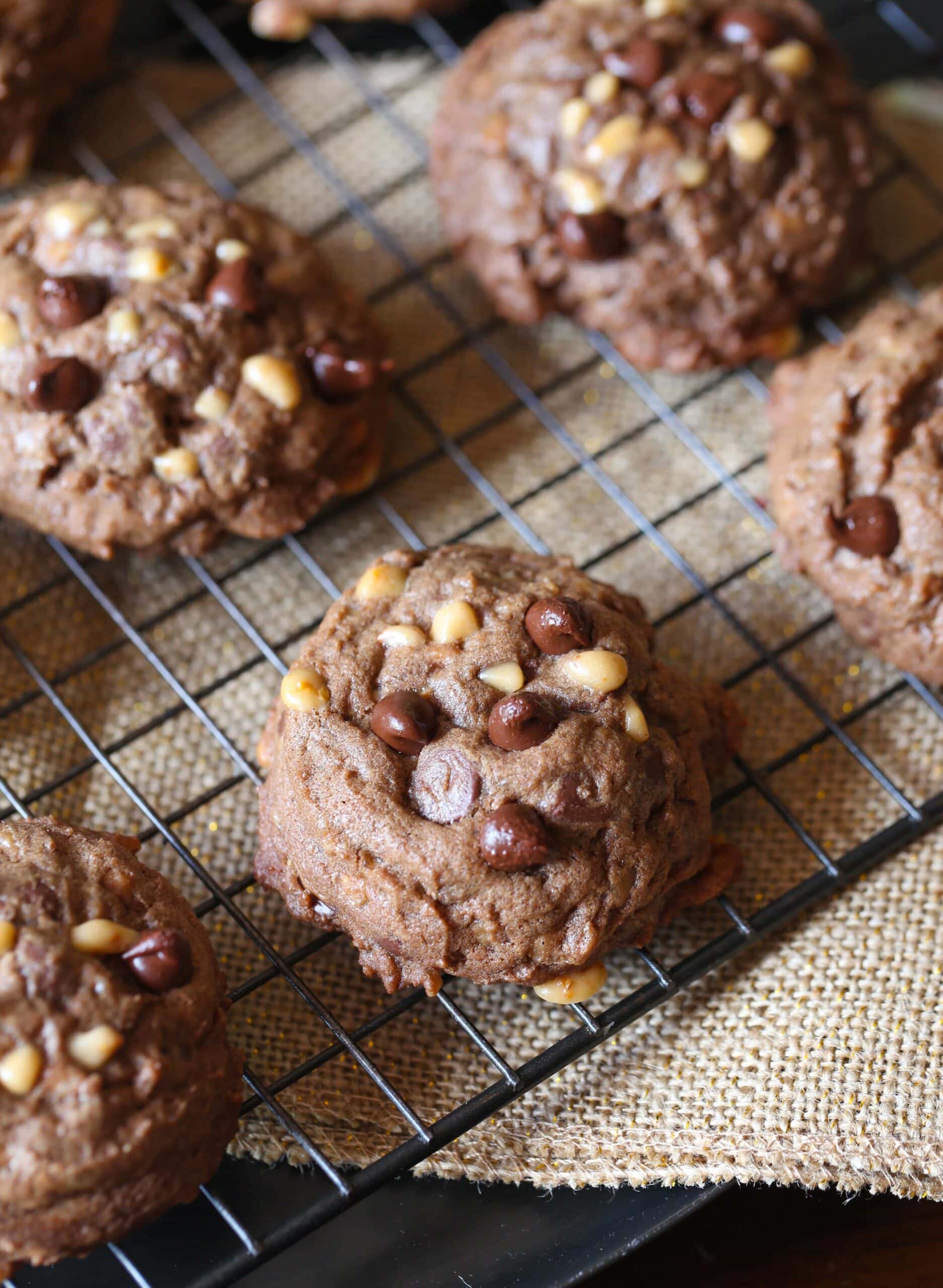 These Chocolate Toffee Cookies are thick, chocolaty and full of chocolate chips and toffee bits! The inside texture is like a brownie! So GOOD!