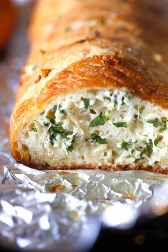 This Epic Stuffed Garlic Bread is the best you will ever make...it's buttery, cheesy and LOADED with fresh garlic!