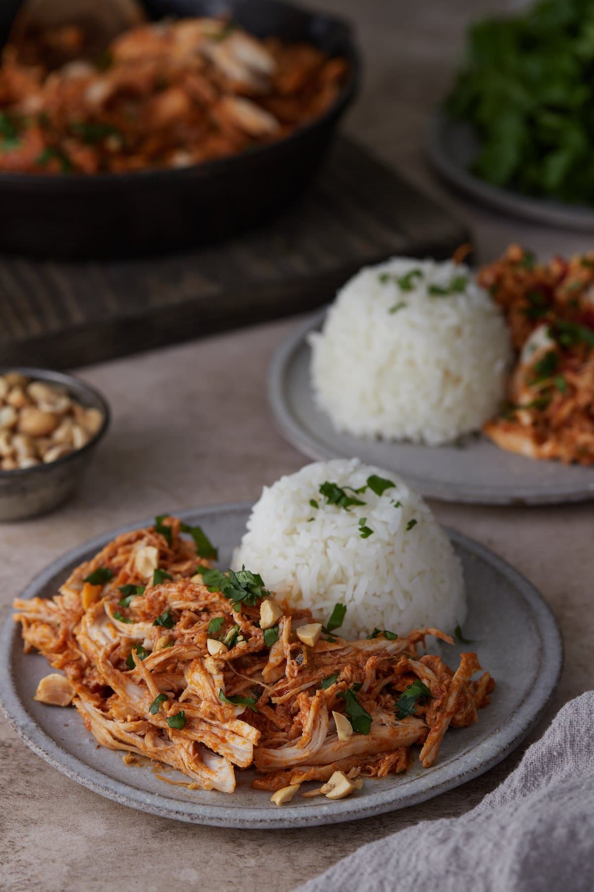 Plates of Thai-style slow cooker chicken and rice.