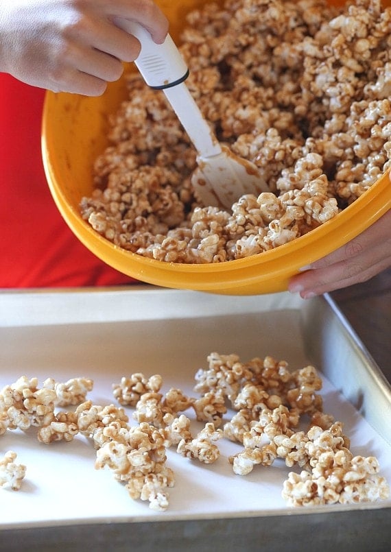 This Pumpkin Pie Spice Caramel Corn is crazy addictive....crunchy, sweet and seasoned with the perfect amount of Pumpkin Pie Spice and salt. Your fall snack for sure!