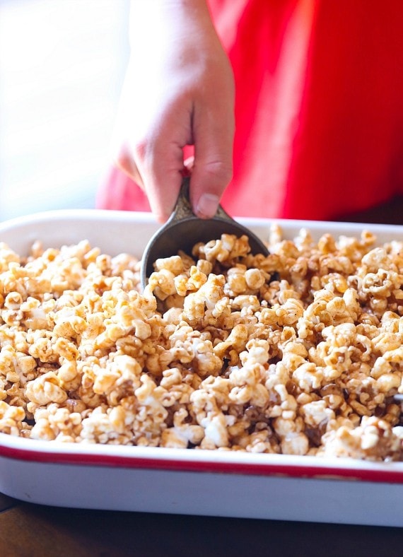 This Pumpkin Pie Spice Caramel Corn is crazy addictive....crunchy, sweet and seasoned with the perfect amount of Pumpkin Pie Spice and salt. Your fall snack for sure!